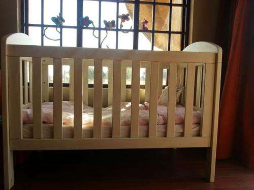 Wooden cot very good condition